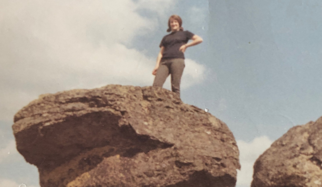 My mom on her visit to the United States. Here is on top of rock found at the Escure Ranch.